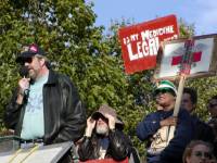 DPFWI & IMMLY's Gary Storck addresses the crowd, as legal patient Elvy Musikka looks on.